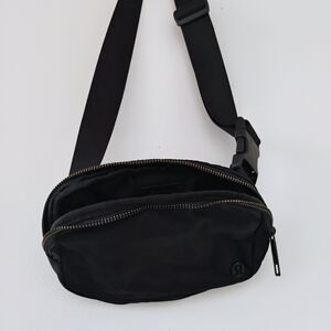 Lululemon Black Belt Bag with Adjustable Strap and Durable Fabric